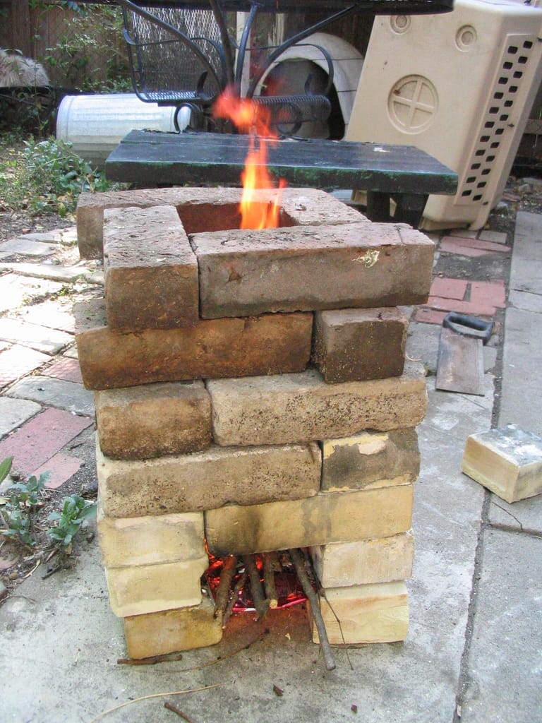 How to Make a Simple, Fuel-Efficient Rocket Stove for Cooking on the Patio  - One Green Planet