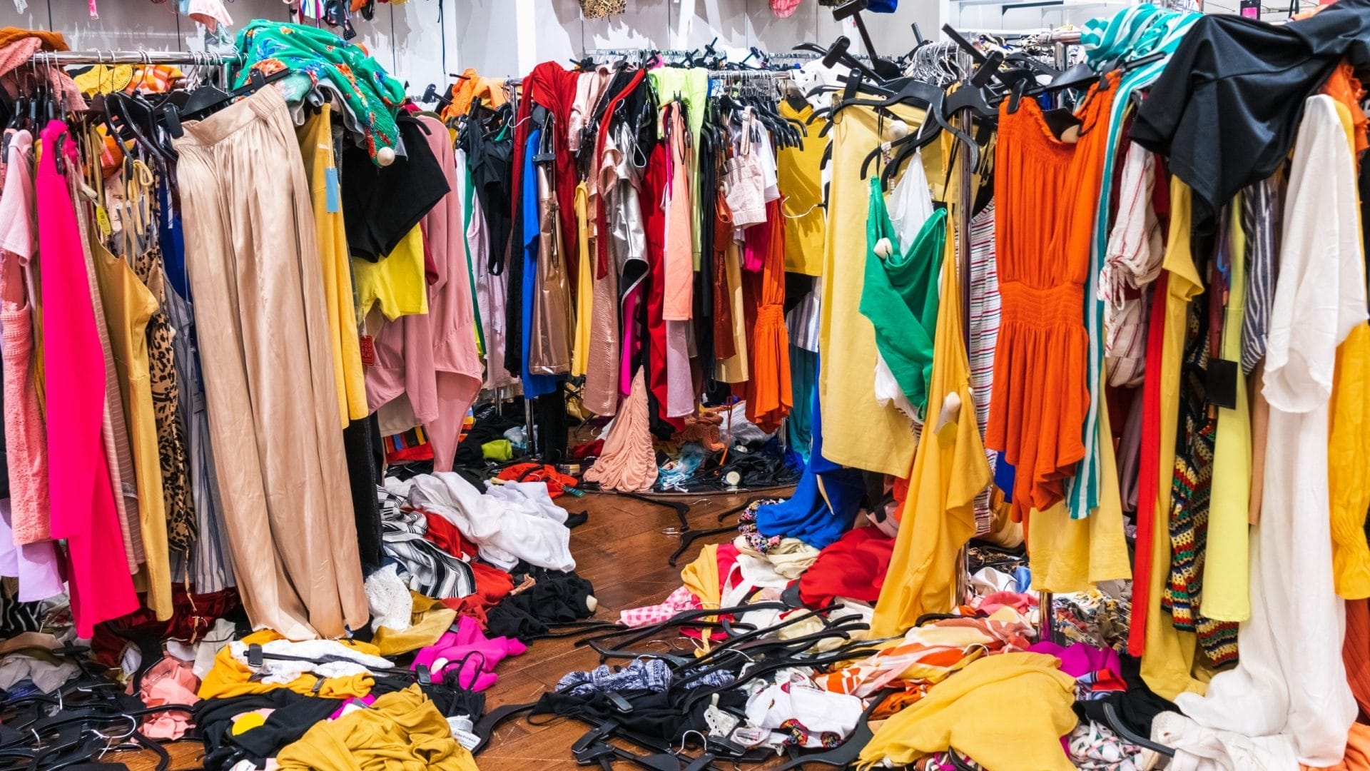 environmental cost fast fashion 2026 microplastics textile waste carbon emissions clothing garment care
