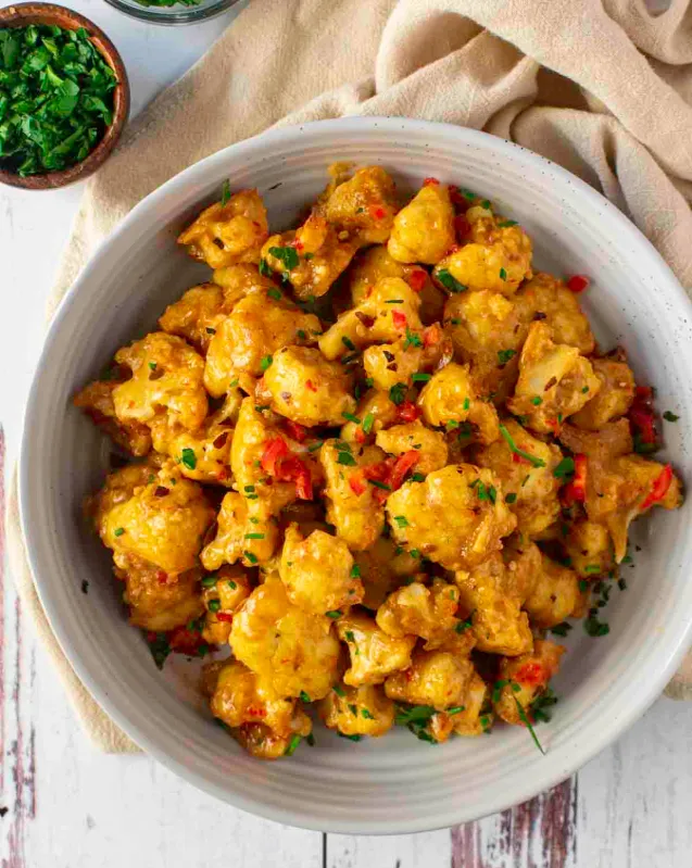 10 Vegan Recipes That Went Viral Last Week: Bang Bang Cauliflower to Vegetable Paella! - Vimarsana News